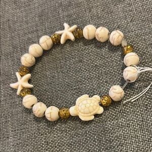 Beaded Bracelet with Turtle and Starfish Accents